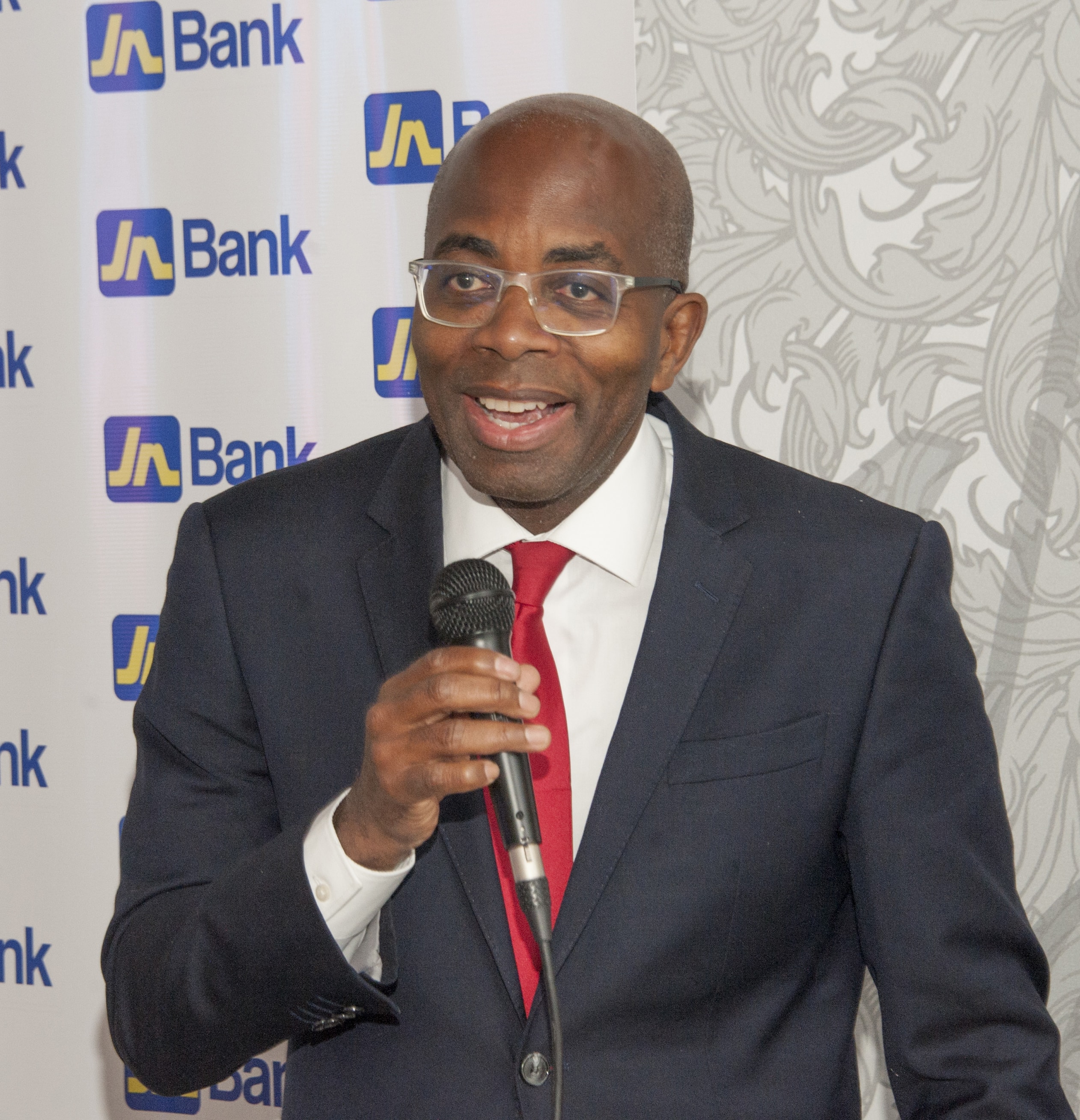 Curtis Martin, managing director, JN Bank addressing a group of Jamaican professionals and business owners at JN Bank’s Representative Office in Florida in June.