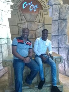 Jerry Ellis with son, Dennis - The Jamaica National Group Jerry Ellis with son, Dennis