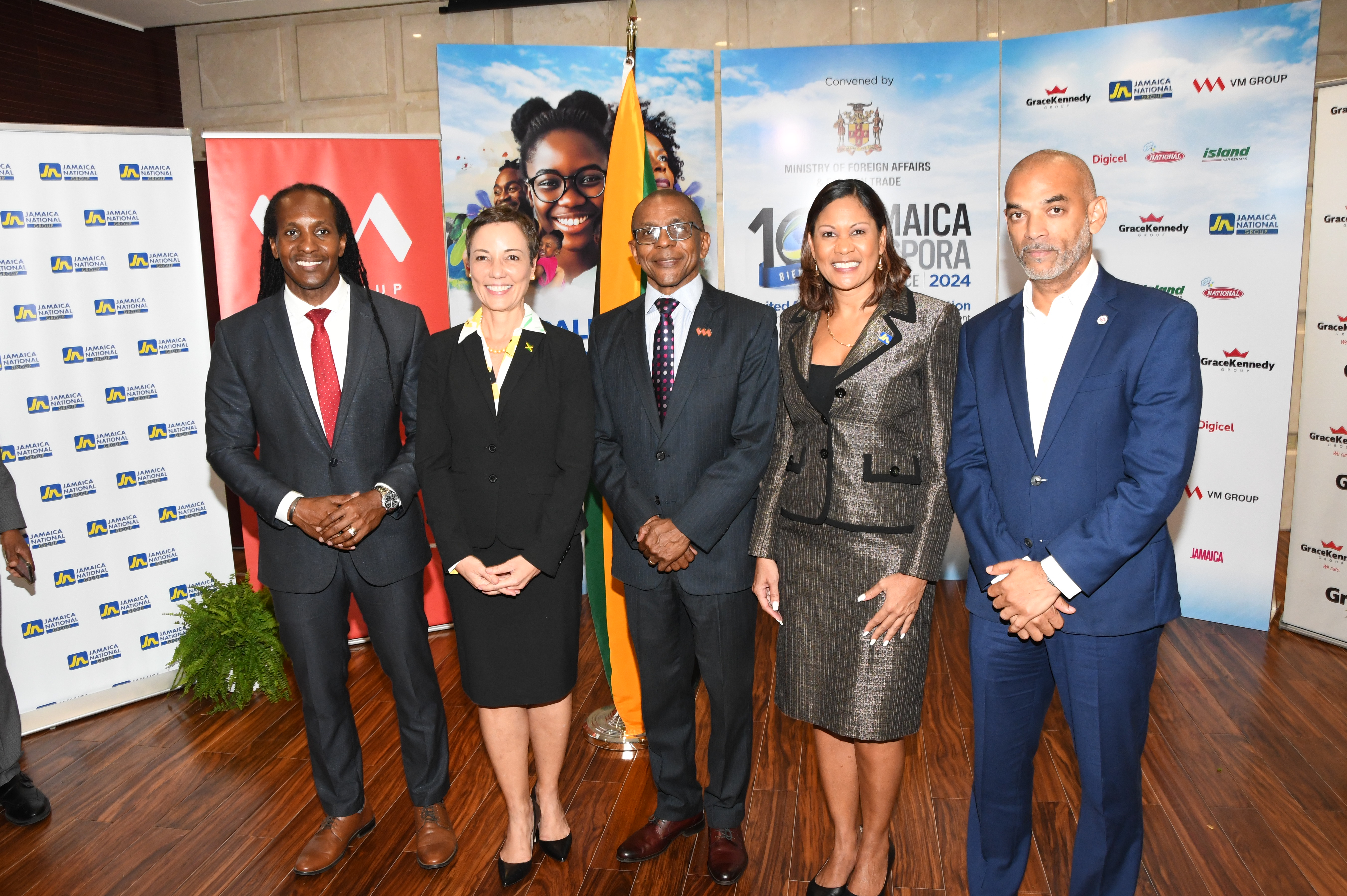 Minister of Foreign Affairs and Foreign Trade, Senator Kamina Johnson Smith ( second from left), pauses for a photo opportunity with State Minister, Alando Terrelonge (left) and Jamaica Diaspora Conference legacy sponsor representatives (from left): Courtney Campbell, president and chief executive officer of VM Group; Leesa Kow, managing director, JN Bank and Gabriel Heron, head, business transformation, GraceKennedy.